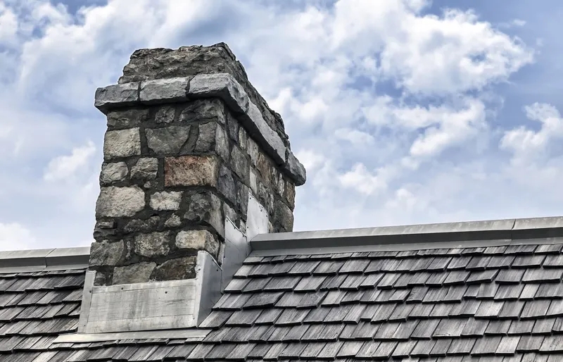 Stone chimney and slate roof repair near Wetherby