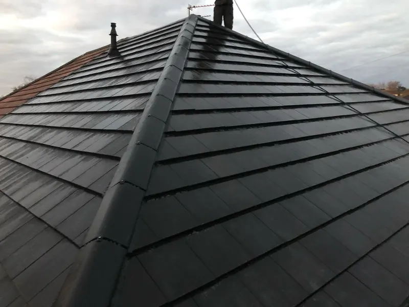 Ridge tiles refixed with dry ridge